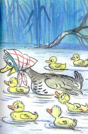 мама утка с утятами на озере